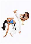 Girls performing Brazilian martial art dance - Capoeira