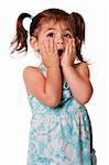 Cute adorable toddler girl surprised innocent expression with hands on cheeks, isolated.