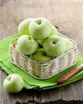 green ripe organic apples in the basket
