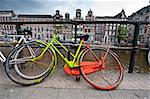 Painted Bicycle on the Embankment of Amsterdam