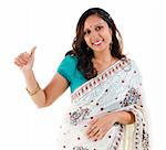 Beautiful Indian woman showing thumb up hand sign on white background