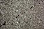 crack on the gray asphalt