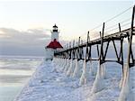 Snow and ice cover pier at St. Joseph Michigan