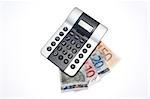 Pocket calculator with banknotes