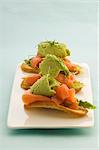 Canapes with avocado sorbet and smoked trout