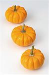 Three baby pumpkins