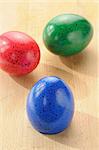 Three coloured eggs