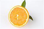 Half an orange with leaves