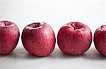 A row of red apples