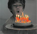 A boy with a birthday cake (alienated)