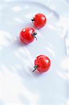 Three cherry tomatoes