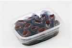 Kalamata olives in a plastic container