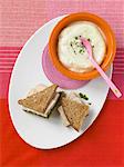 Bowl of Cauliflower Soup; Turkey Pesto Sandwich on Whole Wheat Bread