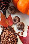 Roasted Kasha in a Wooden Spoon; Autumn Leaves, Acorns and Pumpkin