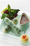 Steamed Vietnamese spring rolls with fish sauce