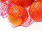 Oranges in a net (close-up)