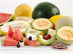 Various types of melon with feta and salami