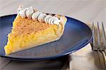 Slice of Homemade Lemon Chess Pie with Whipped Cream