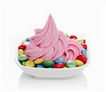 Strawberry yogurt ice cream with coloured chocolate beans