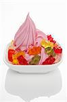 Strawberry yogurt ice cream garnished with gummy bears