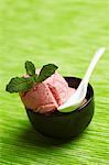 Strawberry ice cream with fresh mint