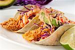 Fried Tilapia Tacos with Slaw, Avocado and Spicy Mayo Sauce