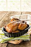 Rotisserie Chicken in Plastic Container with Lid Off