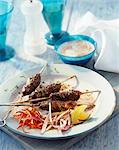 Minced lamb kebab with a yogurt dip