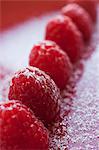 A row of raspberries (close up)