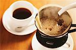 Tasse de Cappuccino avec une tasse de thé
