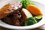 Plate of steak and kidney pie