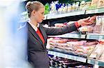 Woman shopping in a supermarket