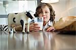 Portrait of a boy drinking a glass of milk