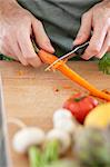 Man cutting carrot