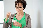 Close-up of a woman having coffee