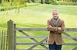 Portrait of a man standing in a park