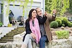 Romantic couple sitting in a garden