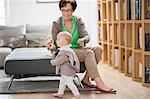 Woman playing with her granddaughter