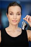 Portrait of a businesswoman holding keys