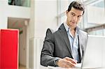 Businessman working on a laptop in an office