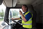 Truck driver on walkie talkie