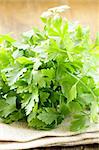 green, organic parsley  on wooden table