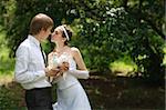 bride and groom with pigeons