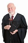 Judge holding his gavel and a bible.  Metaphor for balancing church and state.  Isolated on white.