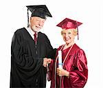 Senior woman receives her diploma at graduation ceremony.  Isolated on white.