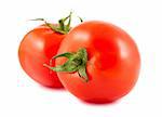 Two red ripe tomatoes isolated on white background