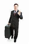 Business traveler gives the A-Okay sign.  Full body isolated on white background.