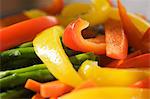 Sliced Yellow and Orange Bell Peppers with Asparagus