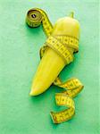 A pointed pepper with a tape measure