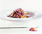 A plate of red and white cabbage salad